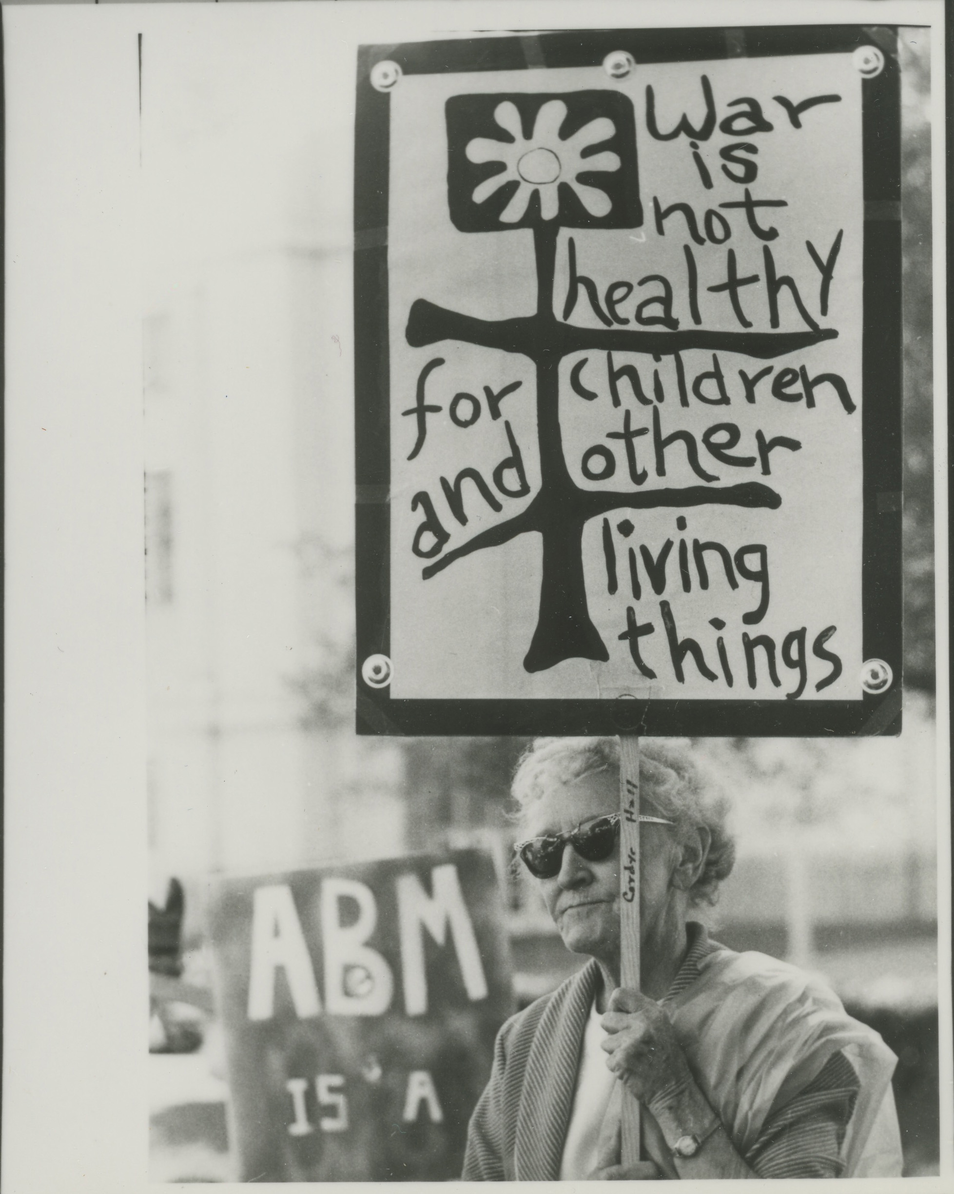 Cordye Hall holding a protest sign